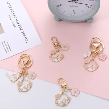 Tartozékok Headset medál csomagolás dekoráció Kulcs kiegészítők Kulcstartók Táska medálok Nyúl macska kulcstartó rózsaszín Sakura
