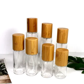 30ML - 100 ml átlátszó üveg bambuszpumpa lotion spray palackok alkoholos porlasztó sminkeltávolító víznyomás Take palack bambusz kupak